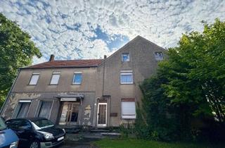 Mehrfamilienhaus kaufen in 59457 Werl, Stark sanierungsbedürftiges Mehrfamilienhaus mit großem Grundstück und Scheune in Werl-Westönnen