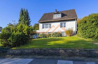 Einfamilienhaus kaufen in 42553 Velbert, Urbanes Wohnerlebnis im Grünen: Großzügiges Einfamilienhaus mit eigenem Bürotrakt