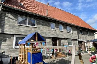 Anlageobjekt in 38667 Bad Harzburg, Vermietetes Zweifamilienreihenhaus mit Garten und Einstellplätzen in Bad Harzburg OT Harlingerode