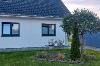 Wohnung kaufen in 26434 Wangerland, Wangerland - Barrierearme Eigentumswohnung auf ca. 315qm Grund mit Seezugang