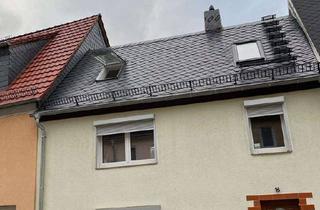 Haus kaufen in 04741 Roßwein, Roßwein - Vermietetes Reihenmittelhaus in Roßwein