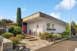 Haus kaufen in 41540 Dormagen, Dormagen - Ein Zuhause mit Perspektive - freistehender Bungalow mit Traumgrundstück in Dormagen-Hackenbroich