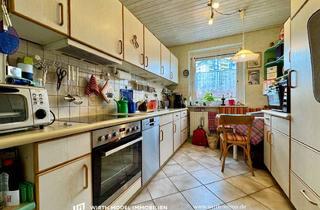 Wohnung kaufen in 97424 Bergl, Schöne Drei-Zimmer-Wohnung mit Balkon und Einzelgarage in ruhiger Lage