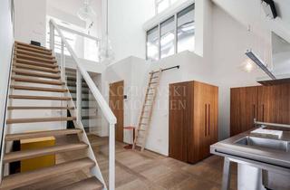 Wohnung kaufen in 68165 Schwetzingerstadt, Design-Ikone am Charlottenplatz - Stylische Dach-Galerie-Maisonette mit Direktlift!