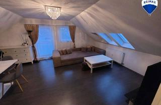 Wohnung kaufen in 32832 Augustdorf, Charmante 2,5-Zimmer-Dachgeschosswohnung in zentraler Lage von Augustdorf
