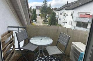 Wohnung kaufen in 72770 Reutlingen, Stilvolle 2,5-Zimmer-Eigentumswohnung mit Balkon, Einbauküche und zwei Tiefgaragenstellplätzen