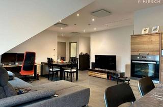 Wohnung kaufen in 90453 Reichelsdorf, Traumhafte Dachgeschosswohnung: Modern und energieeffizient!