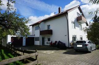 Haus kaufen in 72810 Gomaringen, 4-Familienhaus mit 2 Garagen und schönem Garten in begehrter Wohnlage