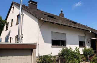 Haus kaufen in 65719 Hofheim am Taunus, Großzügiges Zweifamilienhaus in Feldrandlage | Hofheim-Langenhain