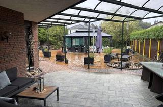 Haus kaufen in 63225 Langen, Bungalow mit großzügigem Garten und Pool in Langen