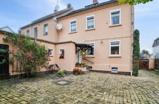 Doppelhaushälfte kaufen in 04288 Holzhausen, Charmante Doppelhaushälfte mit Ausbaupotential und Gartenidylle in Leipzig