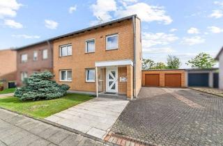 Mehrfamilienhaus kaufen in 50354 Hürth, Gepflegtes Zweifamilienhaus mit Garage und Garten in ruhiger Lage von Hürth