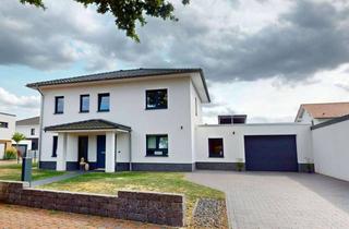 Villa kaufen in 38531 Rötgesbüttel, DESIGN TRIFFT GEBORGENHEIT: MODERNE STADTVILLA AM WALDRAND!