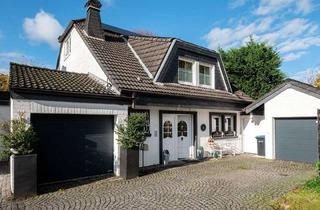 Villa kaufen in 40885 Ratingen, Moderne Landhausvilla mit Charme und Komfort