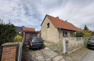 Doppelhaushälfte kaufen in 06886 Lutherstadt Wittenberg, Sanierungsbedürftige Doppelhaushälfte zu verkaufen