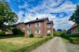 Haus kaufen in 59394 Nordkirchen, Attraktives Zweifamilienhaus inklusive Baugrundstück in zentraler Lage