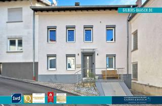Haus kaufen in 54457 Wincheringen, Wincheringen: Saniertes Reihenmittelhaus mit Terrasse und Scheunengebäude zur Nutzung als Garage