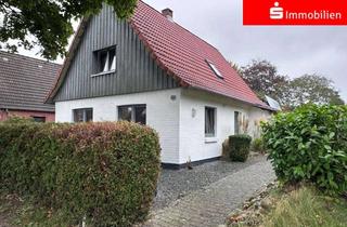 Einfamilienhaus kaufen in 25746 Heide, Charmantes Einfamilienhaus mit hellem Wintergarten und Dachterrasse