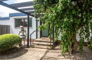 Haus kaufen in Grenzweg 27, 30880 Laatzen, Schöner L-Bungalow mit Traumgarten, Baujahr 1971