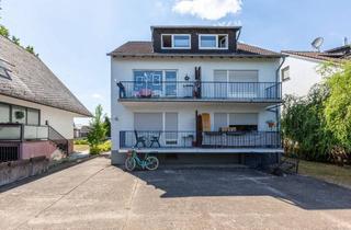 Mehrfamilienhaus kaufen in 63110 Rodgau, Mehrfamilienhaus mit 5 Wohneinheiten und 4 Garagen in Rodgau-Jügesheim