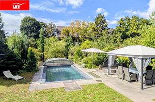 Haus kaufen in 65428 Rüsselsheim, Traumhaftes Zweifamilienhaus in Alt-Haßloch – Wohnen in Toplage mit Pool, Gartenparadies & Komfort