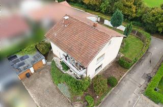 Haus kaufen in 69469 Weinheim, Attraktives Zweifamilienhaus mit Einliegerwohnung, Garagen und großem Garten mit großem Potential !