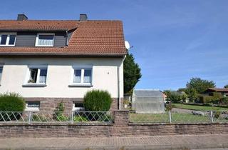 Doppelhaushälfte kaufen in Höfeweg, 37632 Eschershausen, Doppelhaushälfte mit Garage in ruhiger und doch zentraler Lage von Eschershausen