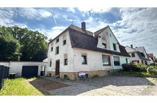 Doppelhaushälfte kaufen in 49090 Osnabrück, Doppelhaushälfte mit 2 Wohneinheiten und Garagen in Osnabrück-Eversburg