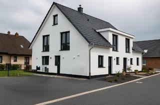 Doppelhaushälfte kaufen in 24536 Tasdorf, Tasdorf - Familienfreundliche helle Neubau-Doppelhaushälfte mit Garten KfW
