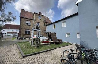 Anlageobjekt in 06766 Bitterfeld-Wolfen, Bitterfeld-Wolfen - Wohn- und Geschäftshaus mit Sanierungspotenzial
