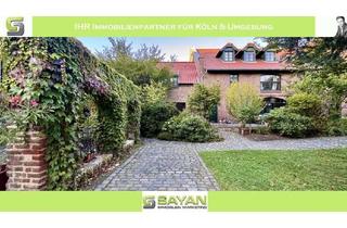 Wohnung kaufen in 50997 Rondorf, SAYAN Immobilien - Rondorf: Traumhafte Gartenwohnung in historischer Hofanlage + 2 PKW-Stellplätze -