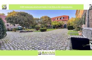 Wohnung kaufen in 50997 Rondorf, SAYAN Immobilien - Rondorf: Traumhafte Gartenwohnung in historischer Hofanlage + PKW-Stellplatz -