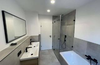 Wohnung kaufen in 91074 Herzogenaurach, Hochwertige, energetisch sanierte 5-Zimmer-EG-Wohnung mit Balkon, Garten u. 2 Garagenstellplätzen