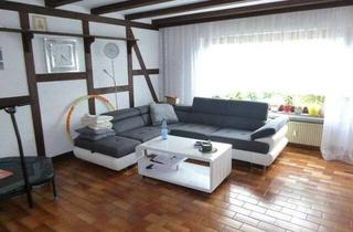 Mehrfamilienhaus kaufen in 35606 Solms, Attraktives Mehrfamilienhaus mit drei Wohneinheiten in Solms.