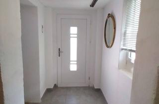 Einfamilienhaus kaufen in 56288 Kastellaun, Charmantes Einfamilienhaus mit großzügiger Terrasse für unvergessliche Augenblicke.