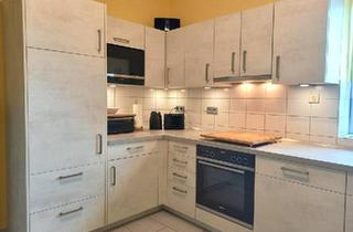 Wohnung kaufen in 31535 Neustadt, Neustadt am Rübenberge - Charmante 3 Zimmer Erdgeschosswohnung mit Garten in Helstorf