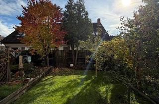 Haus kaufen in 90455 Nürnberg, Nürnberg - Gepflegtes Reihenmittelhaus mit Wintergarten, Kamin & Garten