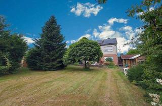 Einfamilienhaus kaufen in 47447 Moers, Moers - Freistehendes Einfamilienhaus mit Einliegerwohnung in Moers-Schwafheim