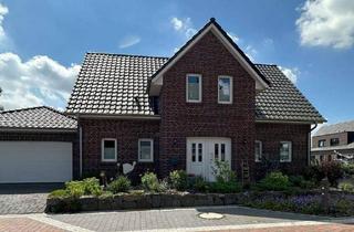 Einfamilienhaus kaufen in 26689 Apen, Apen / Augustfehn - Modernes Wohnen trifft ländliche Idylle - Neubau-Einfamilienhaus in Apen