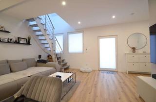 Wohnung kaufen in 65719 Hofheim am Taunus, Schick sanierte 2,5 Zimmmer in Wallau: Modern leben in historischer Umgebung