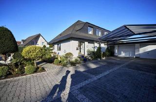 Einfamilienhaus kaufen in 59558 Lippstadt, Lippstadt - Gepflegtes Einfamilienhaus mit großem Garten und zwei Garagen in Hörste