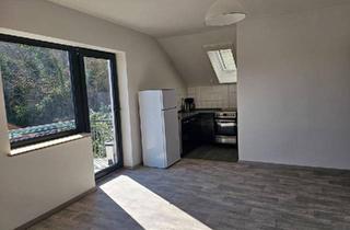 Wohnung kaufen in 97877 Wertheim, Wertheim - Kapitalanlage in Wertheim - DG-Wohnung mit Balkon und Garage