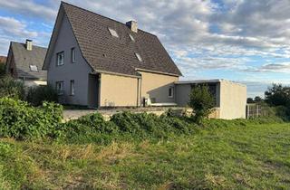 Einfamilienhaus kaufen in 47495 Rheinberg, Rheinberg - Rheinberg - Saniertes freistehendes Einfamilienhaus am Feldrand