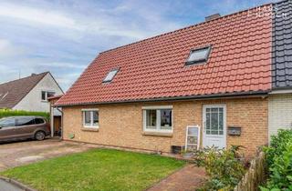 Doppelhaushälfte kaufen in 25746 Heide, Heide - Familienidyll auf großem Grundstück