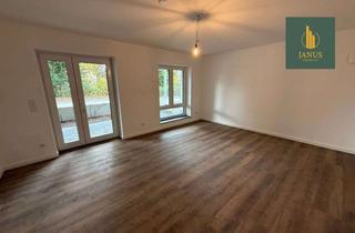 Wohnung kaufen in 32049 Herford, Nachhaltig und stilvoll: Gartenwohnung mit Terrasse und Top-Energieeffizienz am Herforder Stiftberg