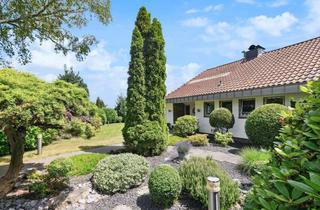 Haus kaufen in 53639 Königswinter, Engel & Völkers: Großzügiger Bungalow mit flexiblem Wohnkonzept in idyllischer Lage!