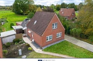 Einfamilienhaus kaufen in 26524 Halbemond, Gepflegtes Einfamilienhaus mit Garage und Weitblick!