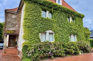 Haus kaufen in 31592 Stolzenau, Zweifamilienhaus mit einer Praxis, einer Wohneinheit und einem idyllischen Garten in Stolzenau!