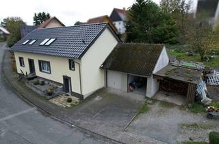 Haus kaufen in 33165 Lichtenau, Zweifamilienhaus mit großem Grundstück in Lichtenau-Holtheim