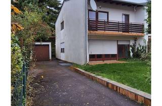 Haus kaufen in 82223 Eichenau, Eichenau, sanierungsbedürftige DHH in ruhiger, sonniger Lage, Anwohnerstraße, nahe Ortsmitte